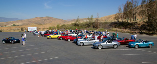 Illustration for article titled Man Uses 44 Miatas To Pull Off Greatest Proposal World Has Ever Seen